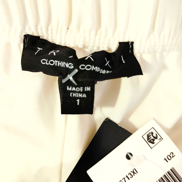 TRIXXI PLUNGE SIDE KNOT SLEEVELESS MINI DRESS, IVORY 1 - Picture 10 of 16